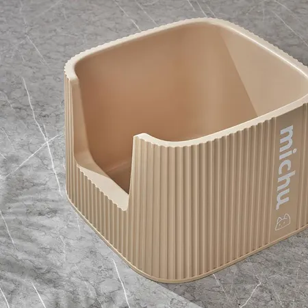A cat litter box with high edges